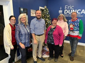 From left with MP Eric Duncan are constituency assistants Rebecca Lance, Adelle Densham, Nicole Lefebvre, Stephanie Andre and executive assistant Adrian Bugelli. Photo on Friday, December 16, 2022, in Cornwall, Ont. Todd Hambleton/Cornwall Standard-Freeholder/Postmedia Network