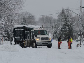 A South Stormont municipal vehicle got stuck in the heavy snow in Rosedale Terrace on Friday December 16, 2022 in Cornwall, Ont. Shawna O'Neill/Cornwall Standard-Freeholder/Postmedia Network