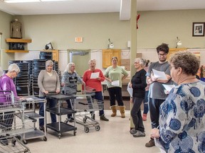 Volunteers get their instructions for packing boxes for the South Dundas Christmas Exchange on Wednesday Dec. 14, 2022.
Phillip Blancher/ Local Journalism Initiative Reporter