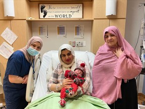 Celebrating are (from left) Dr. Shamsa Deeb, with mom Sarah and baby Aila and her mother-in-law.Handout/Cornwall Standard-Freeholder/Postmedia Network