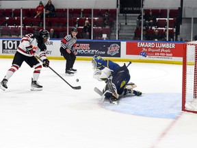 Valerie Wutti/Hockey Canada Images
Canada West's Sam Huck takes a shot on Swedish goaltender Noah Erliden during the World Junior A Challenge bronze-medal game at the Cornwall Civic Complex on Sunday, Dec. 18, 2022. Sweden won 3-2.