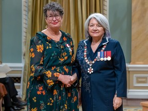 Executive Director for the Community & Advocacy Legal Centre Michelle Leering receives the Order of Canada from Governor General Mary Simon at Rideau Hall on Thursday, Dec. 1.