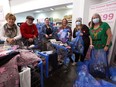 Some members of the Newburgh Community Christmas Concert cast spent Sunday morning shopping at the Napanee Walmart for Christmas gifts for 260 children in the community in need. The volunteer cast raised $36,000 through the annual Christmas show to purchase the gifts for kids identified by staff in 14 different schools across the region. This was the concert's 43rd year running.