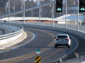 A vehicle drives along the new Waaban Crossing in Kingston on Dec. 20.