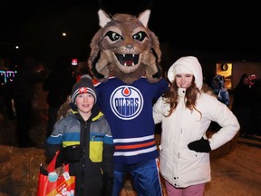 Nine-year-old Treytin French met Jaylyn of the Edmonton Oilers' Hunter and Orange and Blue Ice Crew.