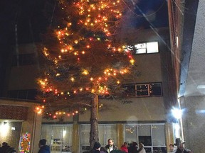Photo by KEVIN McSHEFFREY
As a light snow fell on Sunday, Dec. 4, as the lighting of the St. Joseph’s Foundation of Elliot Lake’s Tree of Lights took place outside of St. Joseph’s General Hospital.