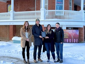 Caitlin Gajdostik (left), grants coordinator for the Community Foundation of Lethbridge and Southwestern Alberta, delivered a grant funding plaque for the Lebel Mansion in Pincher Creek on Thursday, which was received by Tristan Walker, municipal energy project lead for the Town of Pincher Creek, and Allied Arts Council of Pincher Creek board members Kassandra Chancey, assistant director, and Stephanie Collins, president.