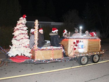 A hot tub kept these folks warm on the Legacy Homes entry on a cold winter's night in Petawawa's Santa Claus parade held on Dec. 3. Anthony Dixon