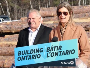 Kristin Shaw, general manager at Herb Shaw and Sons, shares the history of the 175-year-old family owned business, the oldest in Canada, while Ontario Premier Doug Ford looks on during a visit to the company on Dec. 12. Anthony Dixon
