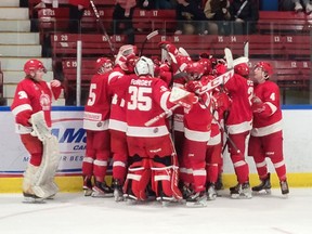 The Pembroke Lumber Kings celebrate after a thrilling 4-3 shoot-out victory over the Renfrew Wolves at the PMC Sunday night. Photo by Tina Peplinskie