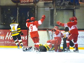Photo by KEVIN McSHEFFREY
Red Wings Silas Crawford score Elliot Lake’s only goal in Saturday’s game against the Soo Michigan Eagles. Crawford goal came with 26 seconds left in regulation time making the score 2-1.