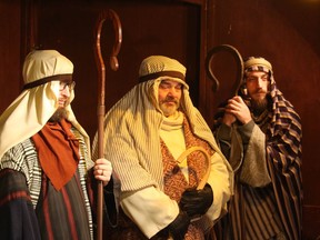 Brendan Newby, left, Fred Brown, center, and Bobby Moore take part Thursday in the live nativity scene at Sarnia's Redeemer Lutheran Church.