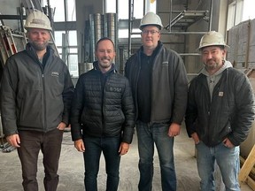 Officials with Jayden Construction pose with Mike Weir during a recent tour of the Youth Wellness Hubs Ontario site under construction in Sarnia. Supply chain issues have contributed to again delaying the project's estimated completion date, this time to spring 2023. Pictured are Jon Van Kesteren, left, Weir, Jason Postma and Norm Peckford. (Submitted)