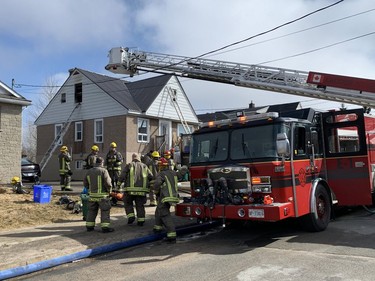 A woman removed from the scene of a fire has died. She was transported to hospital following a fire at a multi-unit building on Buchanan Street in Sudbury, Ont. on Friday April 8, 2022. Deputy Fire Chief Jesse Oshell said firefighters located the woman in the building and performed CPR on her until paramedics arrived on the scene and transported her to hospital. John Lappa/Sudbury Star/Postmedia Network