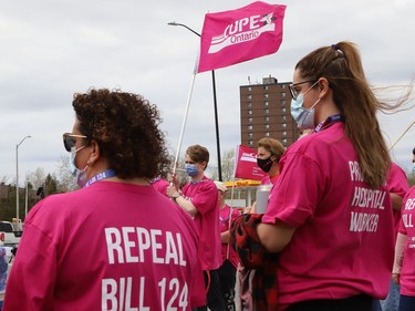 Members of CUPE Local 1623 and supporters take part in a rally in Sudbury, Ont. on Tuesday May 10, 2022. The union wants Bill 124 repealed. The bill, which remains in effect, caps wages on hospital workers. John Lappa/Sudbury Star/Postmedia Network