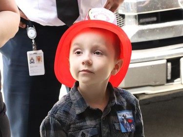 Jackson Twain, 4, visited with firefighters at the downtown fire station in Sudbury, Ont. on Wednesday May 11, 2022. Little Jackson was diagnosed with a rare form of pediatric cancer last August after a tumour was discovered in his lumbar area. Sadly, he died July 1. John Lappa/Sudbury Star/Postmedia Network