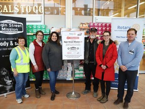 Barb Roy, left, of the Rotary Club of Sudbury Sunrisers, Bailey Byrne, of the Day Group, Amanda Robichaud, director/chaplain of the Elgin Street Mission, Bart Day and Melissa Christie, of the Day Group, and Chris Cummings, of Chris's Your Independent Grocer, were on hand for the launch of Mission 31  on Monday.