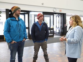 Sudbury MP Viviane Lapointe chats with avid cyclists Tony Fedec, left, and Rob Klein following a federal funding announcement of $3.35 million on Monday to support two active transportation projects, including the 2.3 km of the Paris-Notre Dame bikeway between Wilma Street and Van Horne Street.