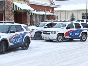 Greater Sudbury Police investigate an early-morning double homicide at the Travelodge Hotel on Paris Street on Dec. 20.