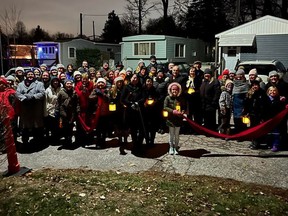 Roughly 50 members of the Christmas Ribbon sang holiday carols in seven locations across Sarnia on Dec. 19.Handout/Sarnia This Week