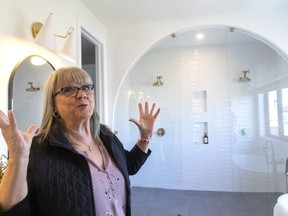 Mary Van Den Berge of Petrolia is overwhelmed by the size of the ensuite at the Elgin County home she won in the Dream Lottery. The sprawling Talbotville home was the grand prize in the annual lottery, which supports London hospitals.
Mike Hensen/Postmedia Network