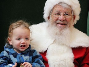 Wells Bragagnolo, 15 months, sits for his first Santa Claus photo on Friday in the centre court of Timmins Square. Santa can be visited in his castle Monday to Sunday until Christmas Eve in the centre court of Timmins Square from 11 a.m. to 2 p.m, and 3 to 7 p.m., Sundays noon to 12:30 and 3 to 5 p.m. Pet night is Dec. 7 and 14, and sensitive Santa night, for children with special needs, is Dec. 10. Visit whereissanta.com to book online and get a free phone call from St. Nick himself.

NICOLE STOFFMAN/The Daily Press