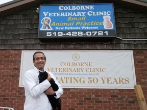 Dr. Paul Arora, owner of Colborne Veterinary Clinic, holds Hoshi, the clinic cat.  The Simcoe area veterinary clinic marked its 50th year in 2022 serving Norfolk, Haldimand and Brant County areas.  CHRIS ABBOTT
