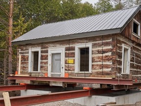 Parks Canada and the Municipality of Northern Bruce Peninsula recently collaborated to move a circa-1800s settler's cabin to the St. Edmunds Township Museum from the Dunks Bay area. The cabin was moved in November and will likely be lowered to its new foundation poured on the museum property next spring. Photo supplied by Bill Caulfeild-Browne