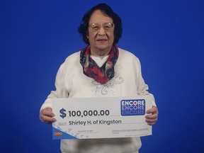 Shirley Hatfield of Kingston with her winnings at the OLG Prize Centre in Toronto.