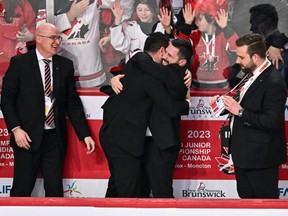 Head coach of Team Canada, Dennis Williams celebrates a victory against Team Czech Republic during overtime in the gold medal round of the 2023 IIHF World Junior Championship at Scotiabank Centre on Jan. 5, 2023 in Halifax. Team Canada defeated Team Czech Republic 3-2 in overtime and become the 2023 IIHF world junior champions.