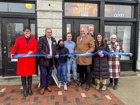 Cookie Jar owners Algerine and Eric Carriere are joined by MPP Todd Smith, Ryan Reid on behalf of MP Ryan Williams, Mayor Neil Ellis, Councillor Kathryn Brown, Dale Hoard from the Belleville Chamber of Commerce and Downtown District BIA Executive Director Luisa Sorrentino for an official ribbon cutting and grand opening ceremony. Submitted