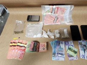 Two Norfolk men were charged after a quanity of illegal drugs and cash were found after Norfolk OPP stopped a vehicle on Main Street in Port Dover on Friday, Jan. 13. NORFOLK OPP/TWITTER