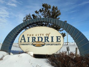 A sign greeting travellers to the community of Airdrie, Alta, is shown northbound on Hwy 2 QE II.