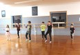 Tuesday afternoons are busy at Gacelas Ballet School as classes such as this Hip Hop class practice their moves under the watchful eye of their instructor.