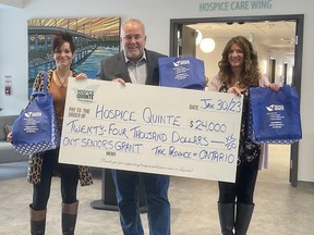 From left, Hospice Quinte community hospice manager Petra Lepage, Bay of Quinte MPP Todd Smith, and donor relations and communications manager Sandi Ramsay gather Monday for a cheque presentation.