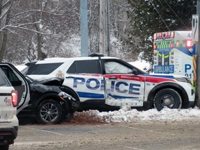 Emergency services at the scene investigating a collision between a Kingston Police cruiser and a small, black four-door car at the intersection of Princess Street and Taylor-Kidd Boulevard Monday morning.