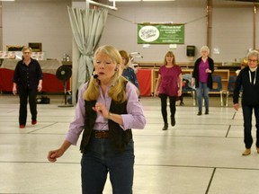 Instructor Cathy Vollett leads Stratford Lakeside Active Adults Association (SLAAA) members in the group's weekly line-dancing class at the Burnside Agriplex Monday morning. Representatives from the association's line-dancing club will be at a Valentine's Day Dance hosted by SLAAA Feb. 14 from 1-3 p.m. to give those in attendance a chance to try out line dancing for themselves. (Galen Simmons/The Beacon Herald)