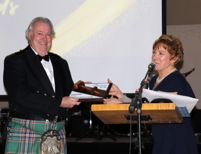 Dickin received a token of the Whitecourt and District Chamber of Commerce’s appreciation from new President Louise Meier.