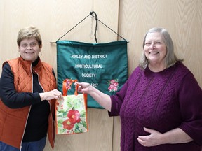 Elaine Shantz, right, thanks Dianne Simpson for her leadership as outgoing Ripley and District Horticultural Society president. Photo by Christine Roberts.