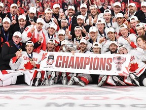 Team Canada players, coaches and staff pose with their gold medals and the IIHF World Championship Cup after defeating Team Czech Republic 3-2 in overtime at the 2023 IIHF world junior championship at Scotiabank Centre on Jan. 5, 2023, in Halifax, N.S. (Photo by Minas Panagiotakis/Getty Images)