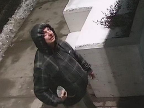 Kingston Police are hoping someone will be able to help identify this man, a suspect in the break and enter of a downtown business on Jan. 24.