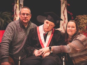 Ethan Tucker is shown here with parents Chris and Shawntel during his graduation ceremony from Brockville Collegiate Institute back in November.