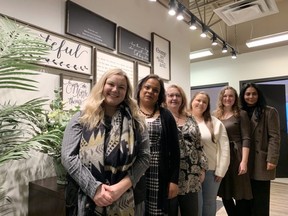 Owner and founder Narissa Singh (second from left) and her team at Onyx Therapy during the practice’s grand opening on Friday, Jan. 13. Lindsay Morey/News Staff