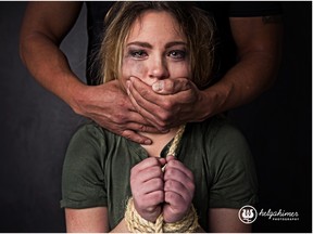 This photo, by Helga Himer for Angels of Hope, depicts a woman being trafficked. She is bound and is being assaulted; however, not all instances of trafficking are quite so dramatic.