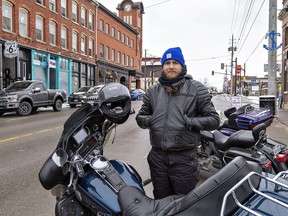 John Bustard, 32, of St. Thomas, Ont., rode his 2001 Harley-Davidson Ultra Classic to Port Dover for the traditional Friday the 13th gathering of motorcyclists on Friday.
