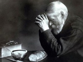 An iconic 20th-century painting of an elderly man praying over a simple meal in front of his Bible. Wikimedia Commons