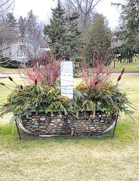 The Cobblestone Basket in the garden at Glenhyrst was made by John Thomas Adams, who was Edmund Cockshutt's gardener.  The style is reminiscent of the Paris cobblestone houses.  Many bridal photos have been taken beside this basket.  Photo by Kevin Shelby