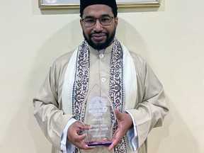 Imam Abu Noman Tarek received the Grand Erie District School Board's Learn, Lead and Inspire Award at a board meeting this week. Submitted.
