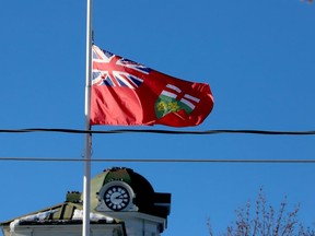 DAVID ONLEY MOURNED
The Ontario flag flies at half-mast with the other flags at Brockville's City Hall on Monday afternoon, to mourn the passing of former Ontario Lt.-Gov. David Onley. The first person with a disability to hold the vice-regal post, Only died Saturday at age 72.(RONALD ZAJAC/The Recorder and Times)
