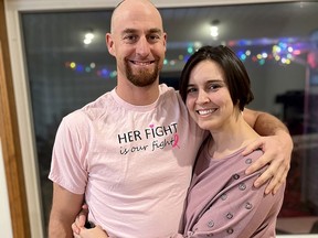 Melissa Harrigan is seen here with her husband Kris, who is wearing a 'Her fight is our fight' T-shirt that are being sold as a fundraiser to help the Chatham-Kent councilor raise awareness about breast cancer.  Handout